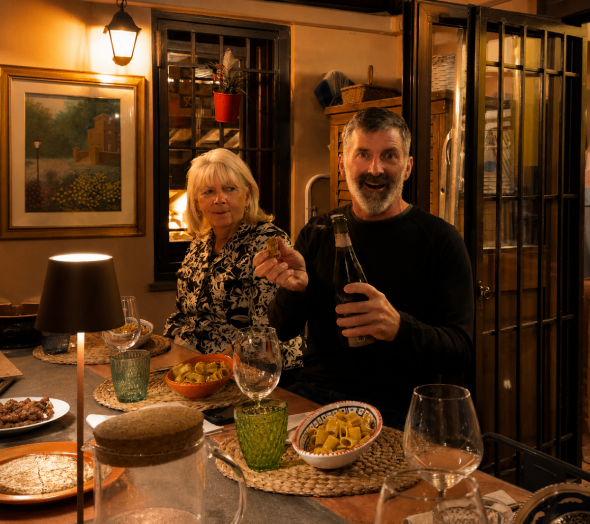 Guests smiling and sharing wine inside Mariella's home